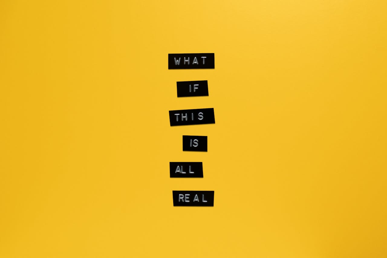 Crafting Captivating Headlines: Your awesome post title goes here Inspirational text 'What if this is all real' on yellow surface.